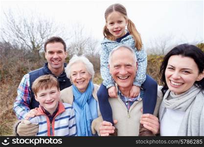 Portrait Of Multi Generation Family On Countryside Walk