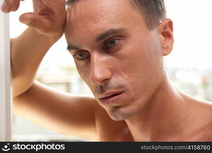 Portrait of muscular man isolated on white