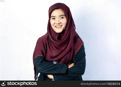 Portrait of muslim asian woman wearing red hijab standing on white background. Business Concept.