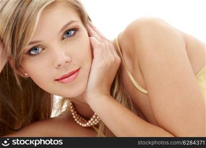 portrait of mysterious blue-eyed blond in pearls