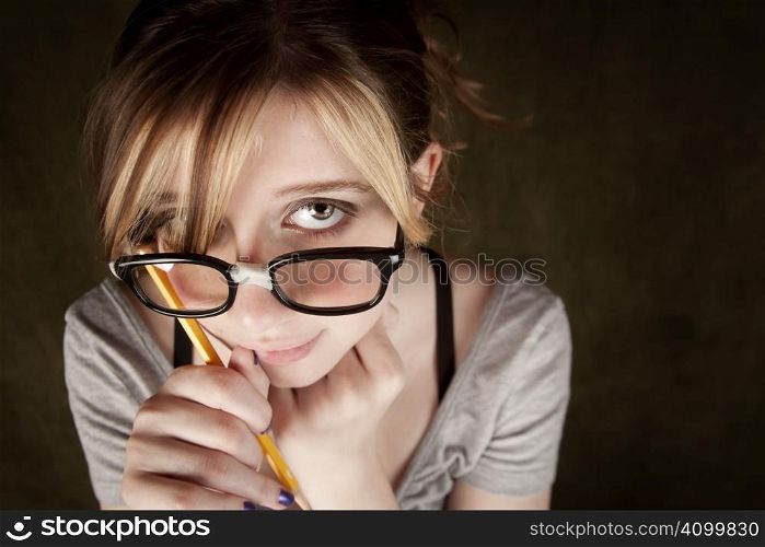 Portrait of nerdy teen girl with green eyes