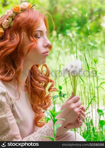 Portrait of nice dreamy woman on fresh green field with dandelion flower bouquet, having fun in the park, enjoy spring nature with closed eyes