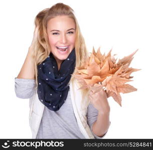 Portrait of nice happy girl with dry maple leaves in hand isolated on white background, enjoying beautiful autumn bouquet