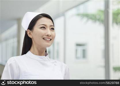 Portrait of Nurse, China, horizontal