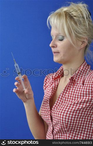 Portrait of Nurse Holding a Syringe. Portrait of Nurse Holding aSyringe