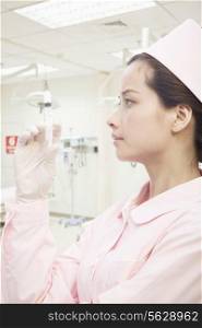 Portrait of Nurse Holding A Syringe, Profile