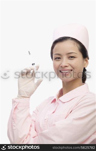 Portrait of Nurse Holding A Syringe, Studio Shot