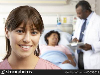 Portrait Of Nurse With Patient In Background