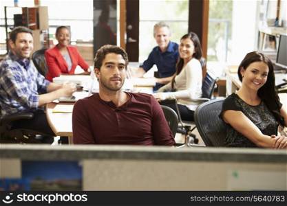 Portrait Of Office Staff At Table In Architect&#39;s Office
