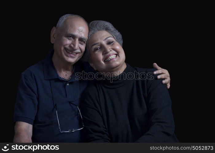 Portrait of old couple smiling