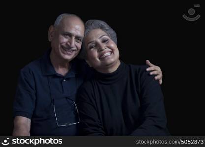 Portrait of old couple smiling