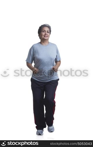 Portrait of old woman exercising