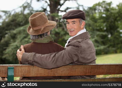 portrait of older people on a bench