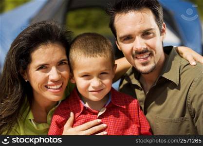 Portrait of parents and their son smiling
