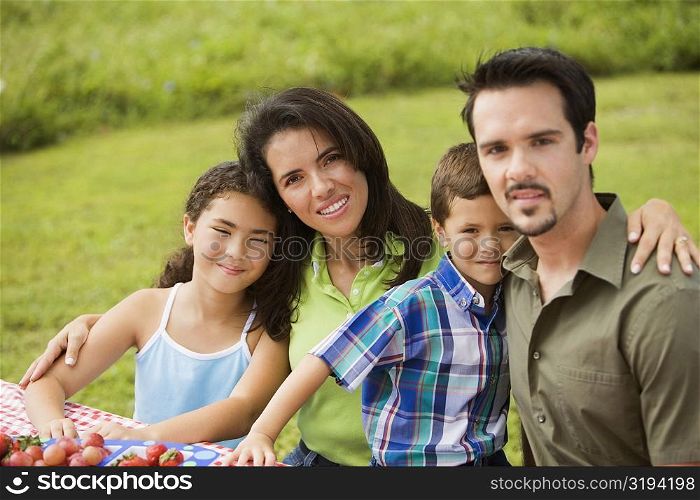 Portrait of parents with their children