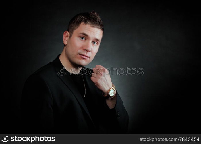 Portrait of pensive man. Close up face on black background