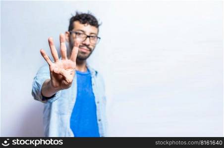 Portrait of people counting number four on isolated background. Person hand counting number four. Handsome guy hand showing number four