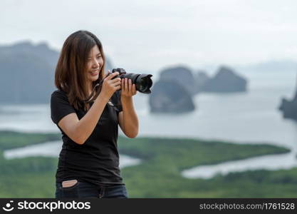 Portrait of photographer or the tourist over the Fantastic Landscape of samed nang chee view point at the sunrise time, Travel and holiday concept