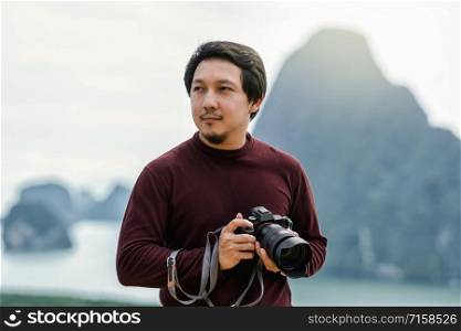 Portrait of photographer or the tourist over the Fantastic Landscape of samed nang chee view point at the sunrise time, Travel and holiday concept