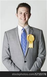 Portrait Of Politician Wearing Yellow Rosette
