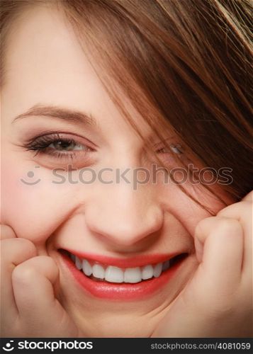 Portrait of positive young woman. Face of happy girl college student. Studio shot.