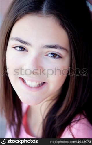 Portrait of preteenager girl with nice expression looking at camera