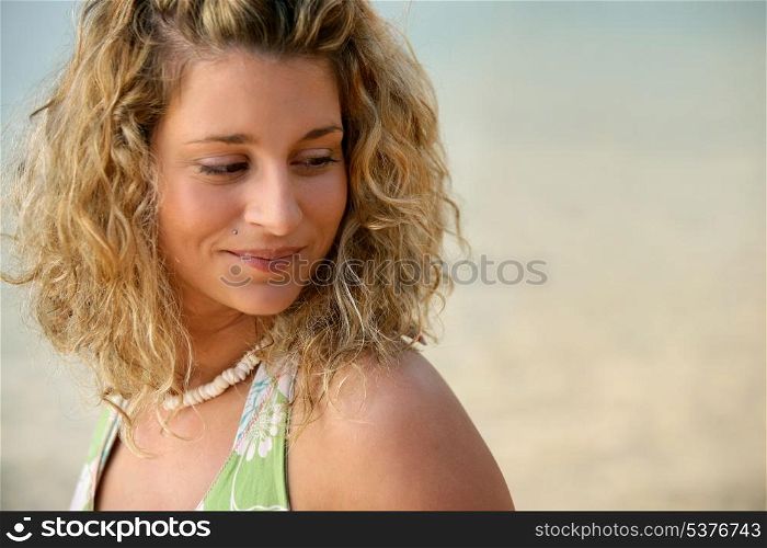 Portrait of pretty girl at the beach