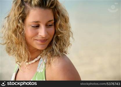 Portrait of pretty girl at the beach