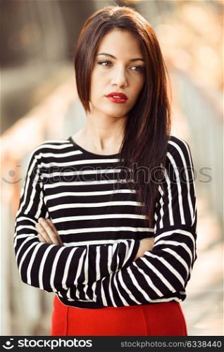 Portrait of pretty girl with green eyes wearing young clothing
