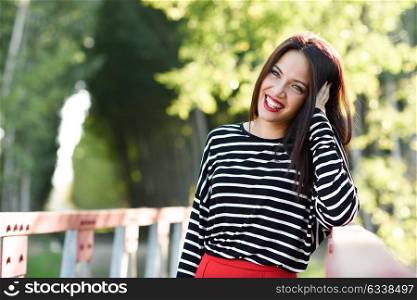 Portrait of pretty girl with green eyes wearing young clothing smiling