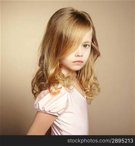 Portrait of pretty little girl. Fashion photo
