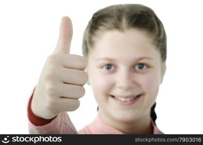 Portrait of pretty little girl showing thumb isolated on white