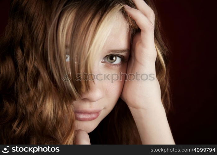 Portrait of pretty teen girl with green eyes