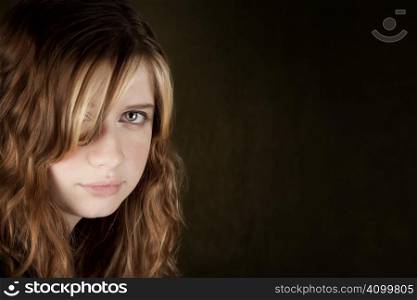Portrait of pretty teen girl with green eyes