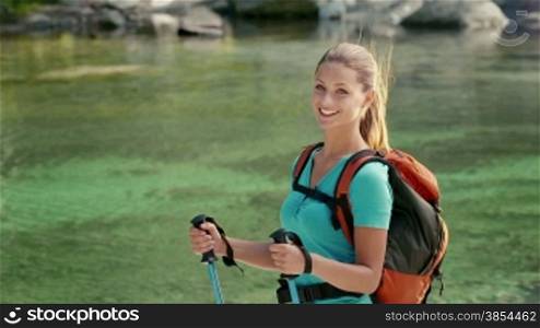 Portrait of pretty young blonde woman during excursion in the woods, girl hiking and trekking on mountains. Part 10 of 12