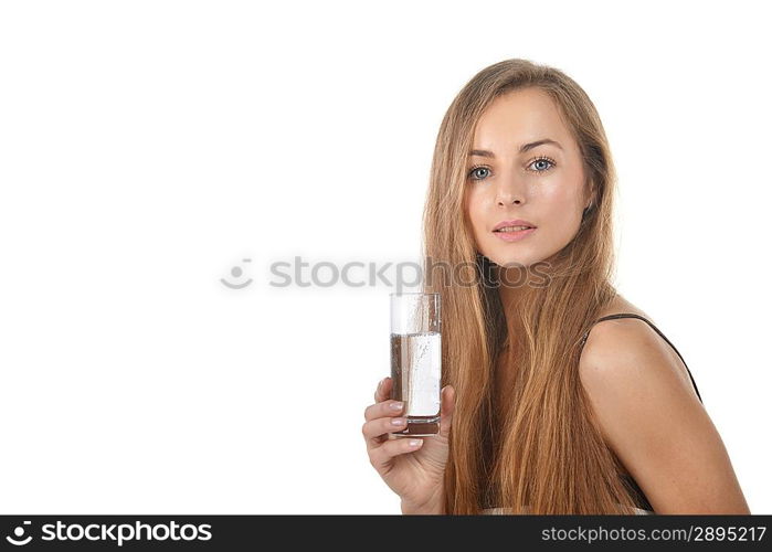 Portrait of pretty young woman holding glass of water