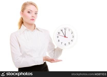 Portrait of professional businesswoman showing clock. Elegant blond girl isolated on white. Time for woman in business. Studio shot.