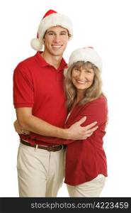 Portrait of proud single mother and handsome young adult son at Christmas time. Isolated on white.