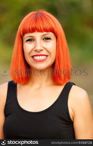 Portrait of red haired woman enjoying of the nature