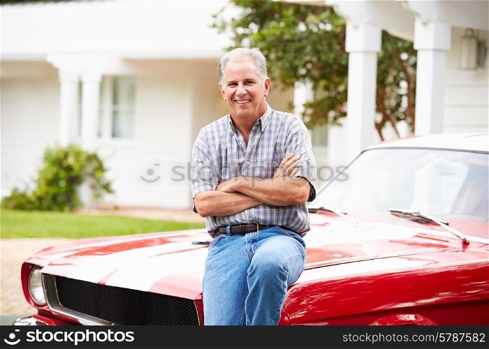 Portrait Of Retired Senior Man With Restored Car