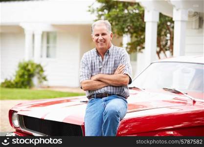 Portrait Of Retired Senior Man With Restored Car