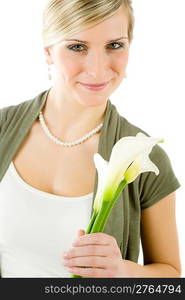 Portrait of romantic woman hold calla lily flower on white