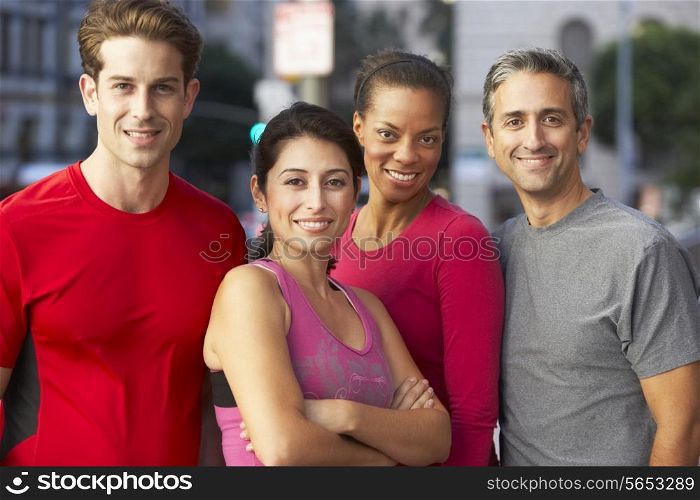 Portrait Of Running Group On Urban Street