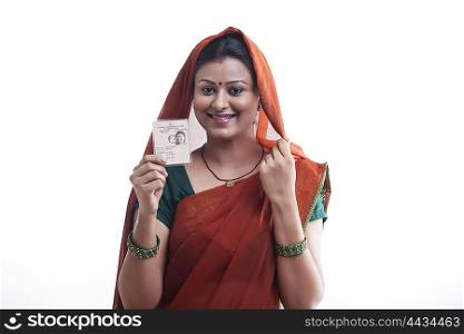 Portrait of rural woman with identity card