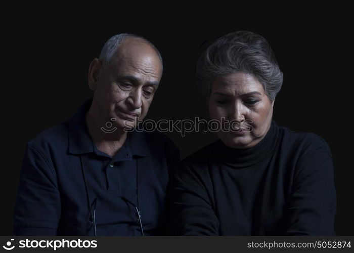 Portrait of sad couple