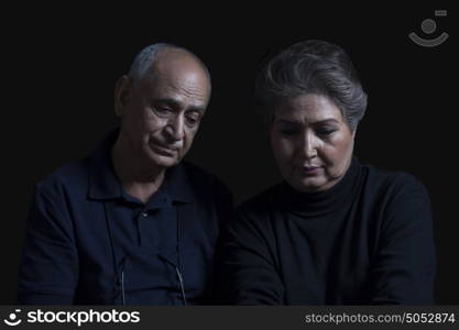 Portrait of sad couple