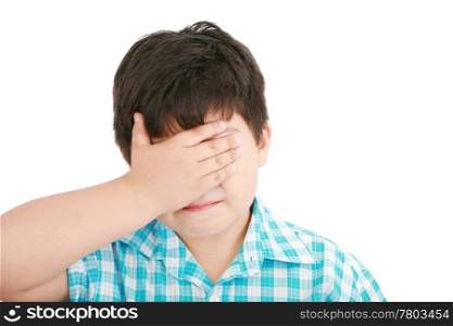 portrait of sad crying little boy covers his face with her hand