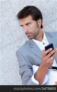 Portrait of salesman talking on mobile phone