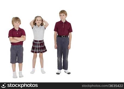 Portrait of school friends standing together over white background