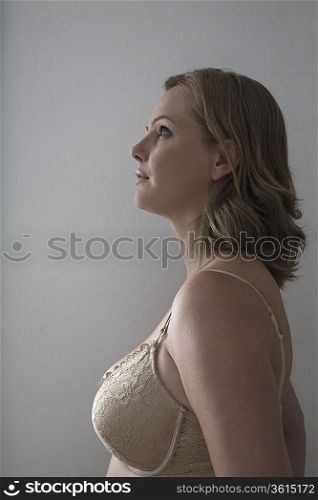 Portrait of semi-dress mid adult woman